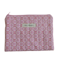 Pink patterned pouch with a brand label zipper pouch