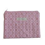 Pink patterned pouch with a brand label zipper pouch