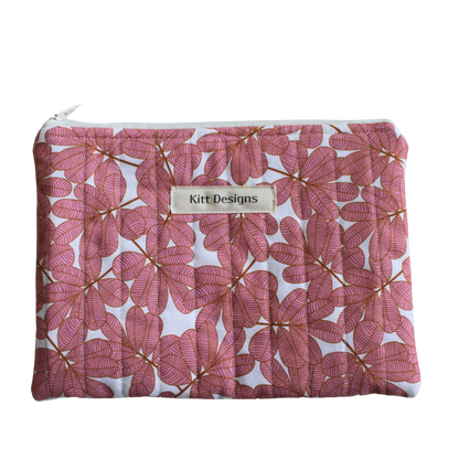 Floral-patterned pouch with a visible brand label zipper pouch