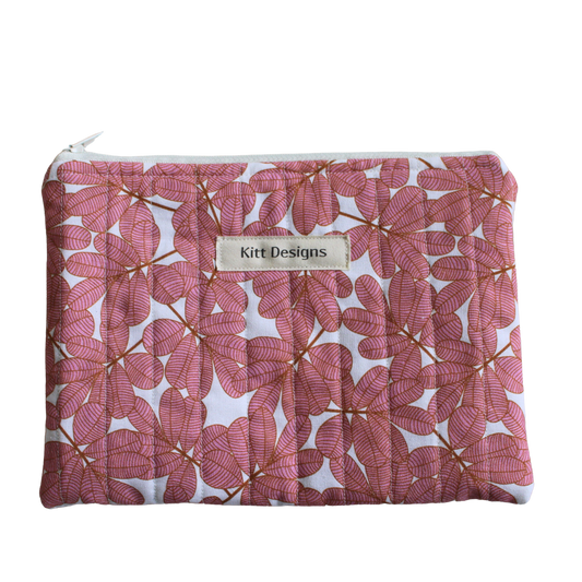 Floral-patterned pouch with a visible brand label zipper pouch