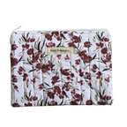 Floral-patterned pouch with 'Kitt Designs' branding zipper pouch