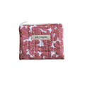Pink floral pouch with 'Kitt Designs' label coin pouch