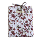 Floral-patterned product with a visible brand label small book sleeve