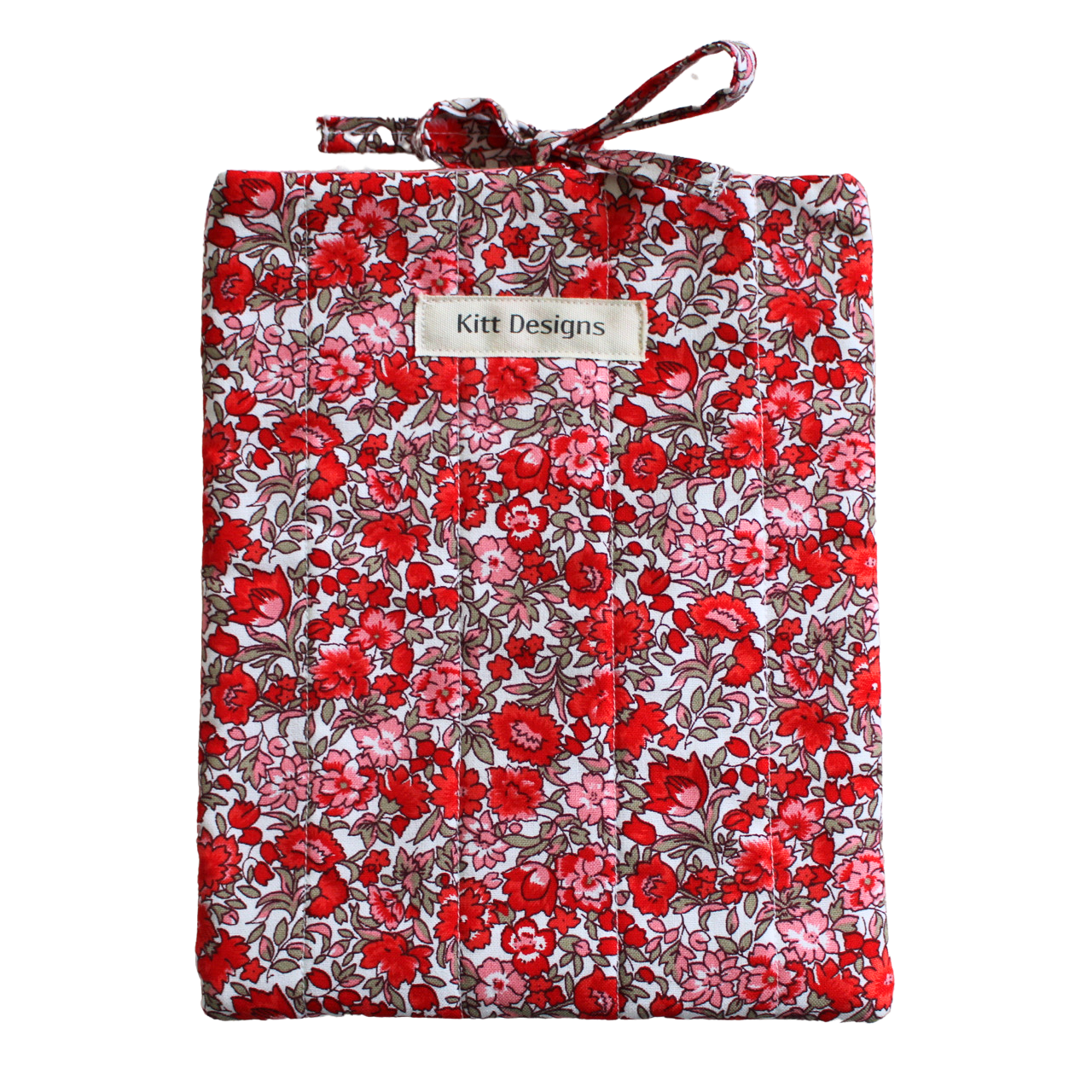 Floral-patterned fabric roll with a visible brand label small book sleeve