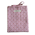 Patterned fabric package with 'Kitt Designs' branding small book sleeve
