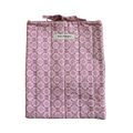 Pink patterned bag with a visible brand label large book sleeve