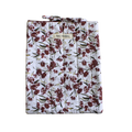 Floral-patterned bag with a visible brand label large book sleeve