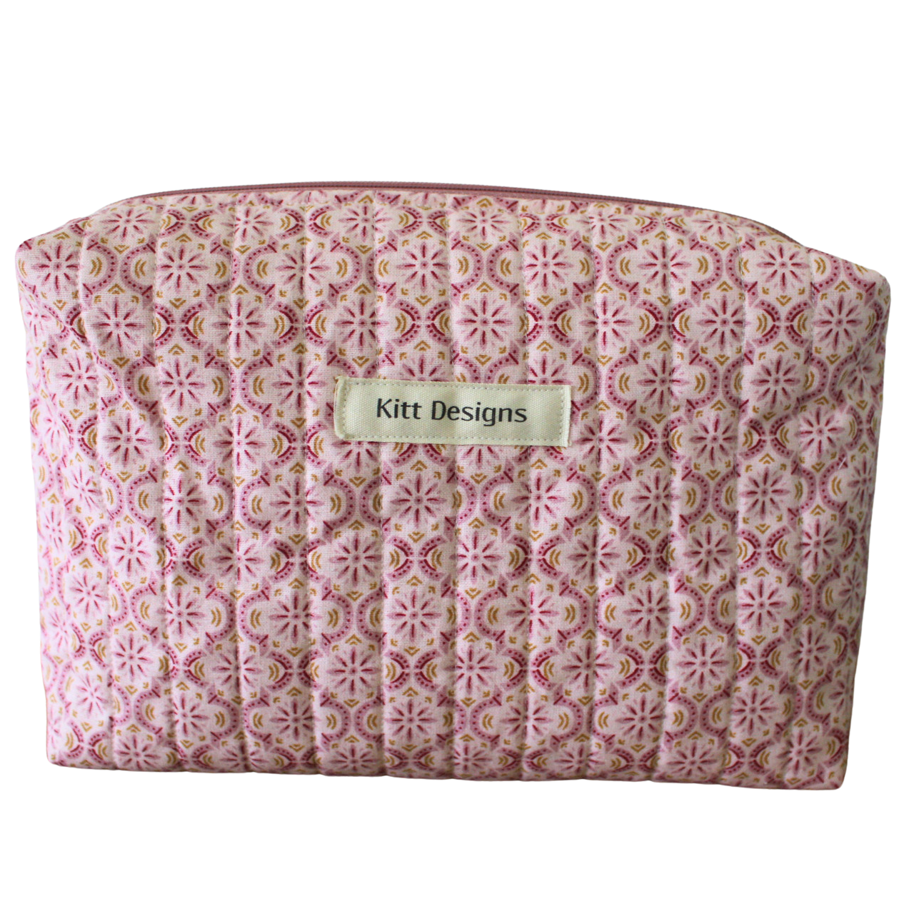 Patterned pouch with 'Kitt Designs' label beauty pouch