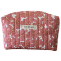 Pink floral-patterned pouch with 'Kitt Designs' label travel pouch