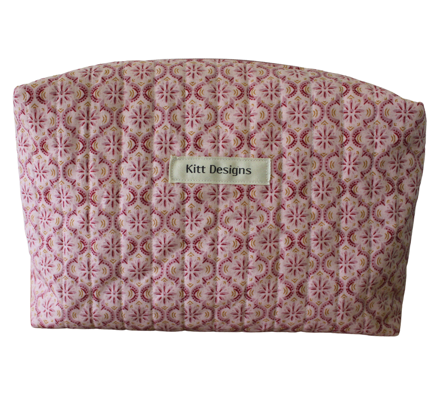 Patterned pouch with 'Kitt Designs' label travel pouch