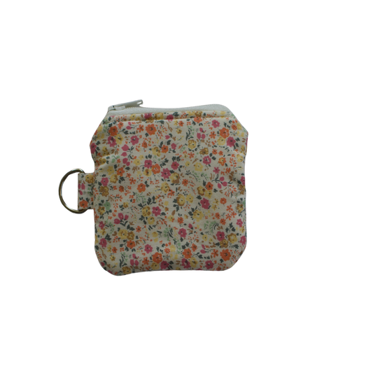 Floral-patterned pouch with a zipper on a white background