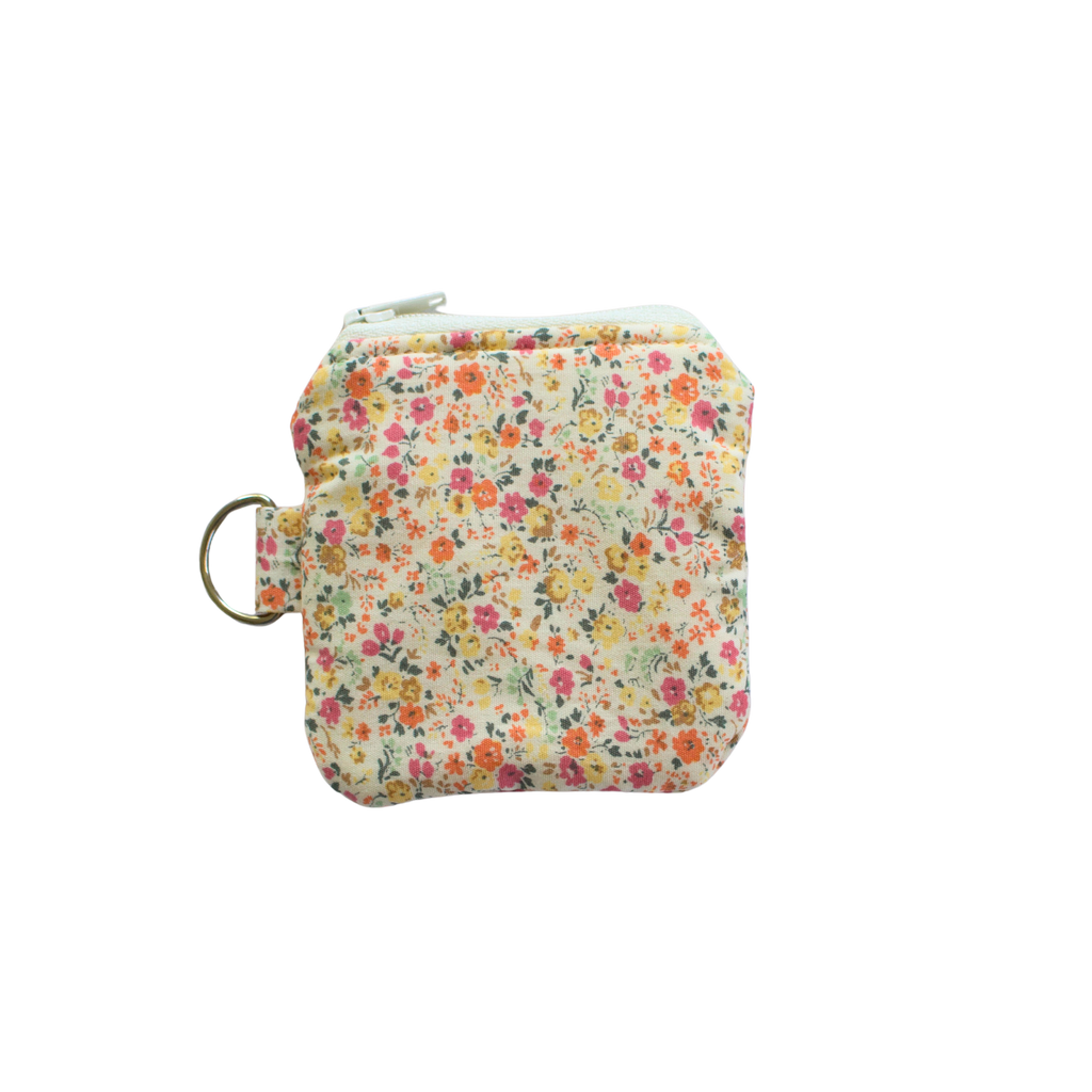 Floral patterned AirPod pouch with zip and d ring