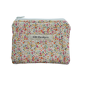 Floral patterned pouch with 'Kitt Designs' label coin pouch coin purse