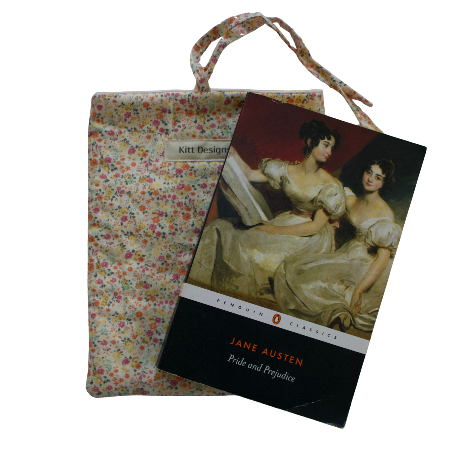 Book cover of 'Pride and Prejudice' by Jane Austen with a floral fabric pouch on a white background small book sleeve