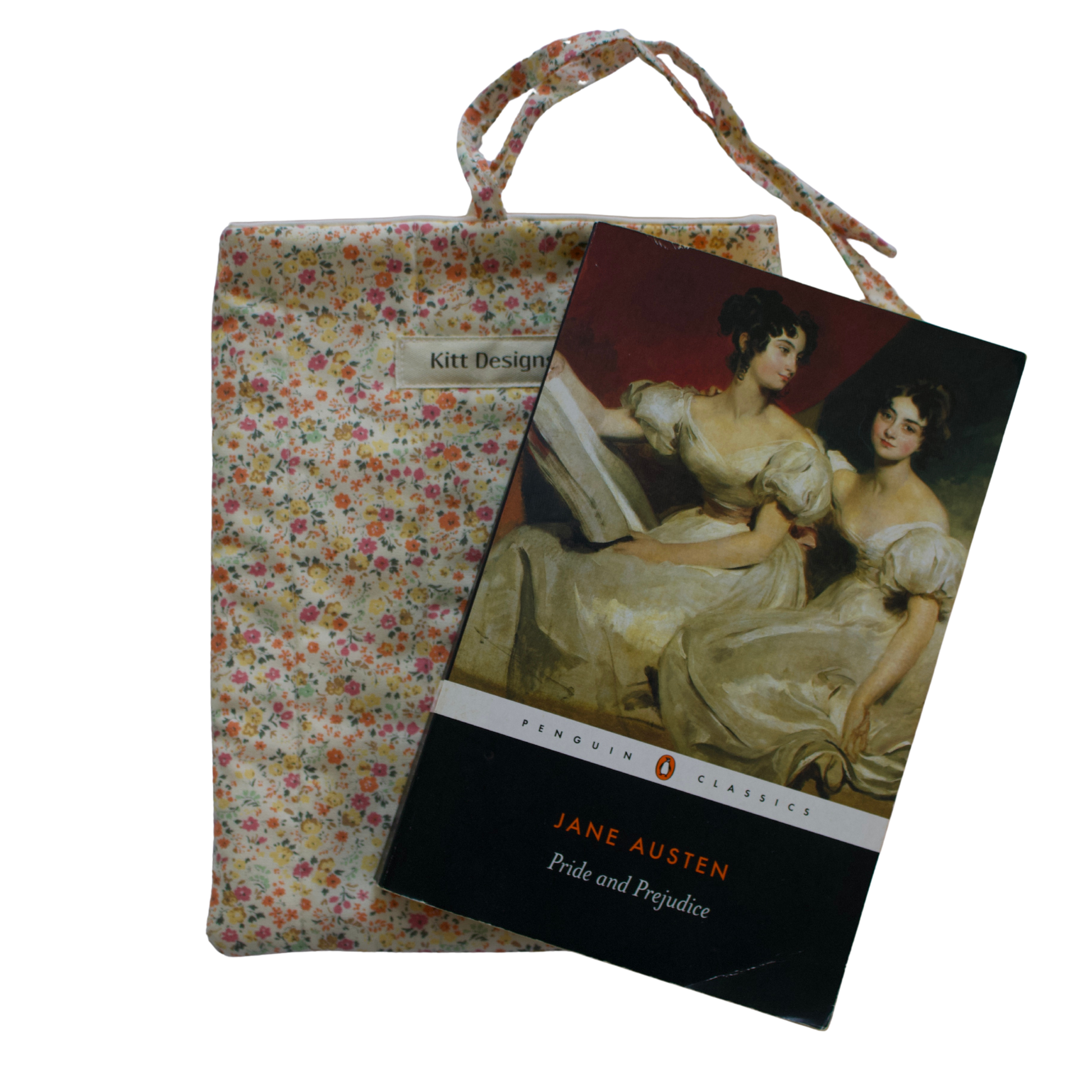 Book cover of 'Pride and Prejudice' by Jane Austen with a floral fabric pouch on a white background small book sleeve