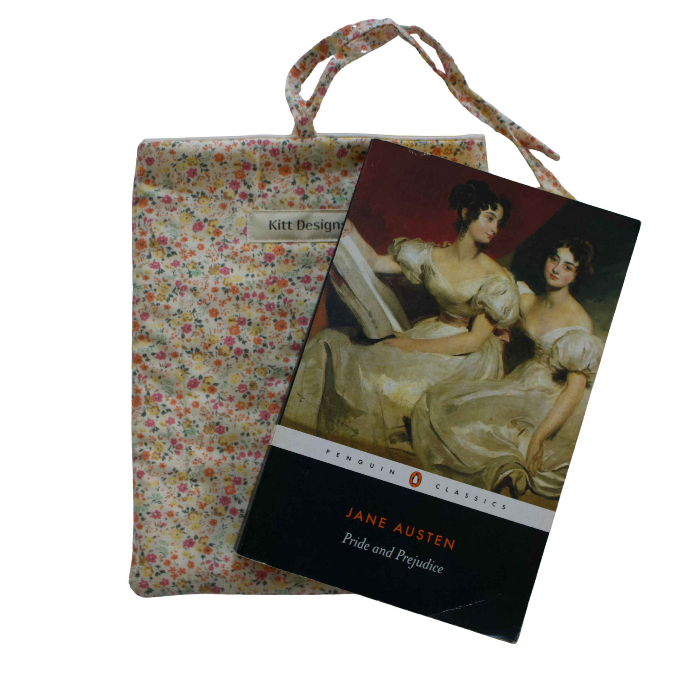 Book cover of 'Pride and Prejudice' by Jane Austen with a floral fabric pouch on a white background small book sleeve