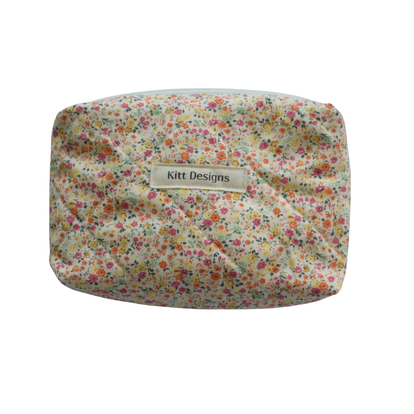 Floral-patterned pouch with 'Kitt Designs' mini pouch
