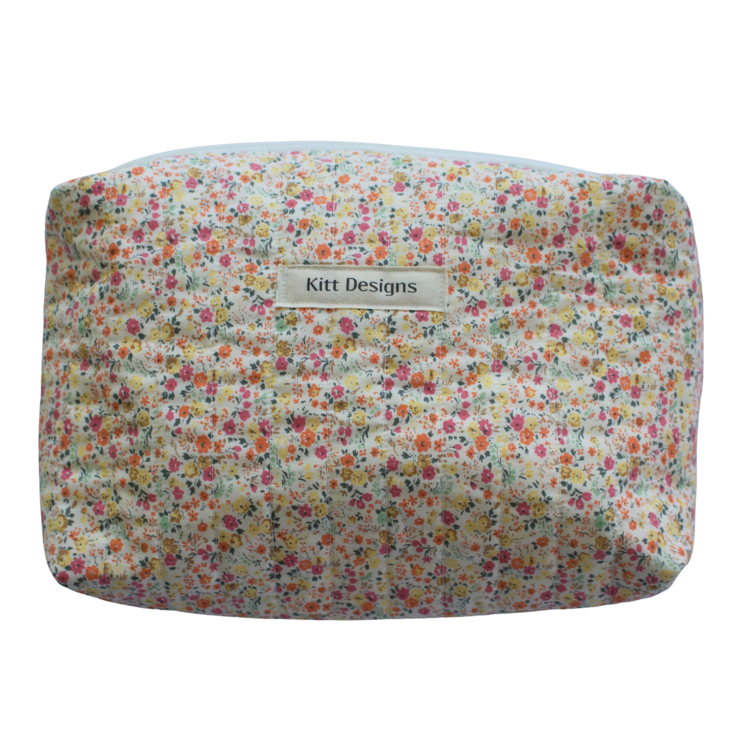 Floral-patterned pouch with 'Kitt Designs' beauty pouch