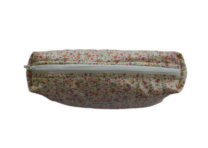 Floral-patterned pouch with a zipper on a white background