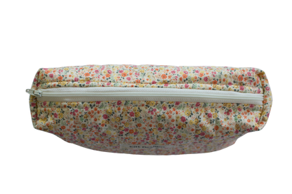 Floral-patterned pouch with a zipper on a white background beauty pouch