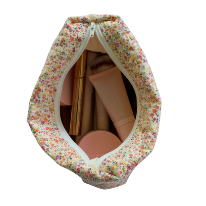 Floral-patterned beauty pouch make up bag with makeup