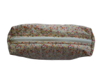 Floral-patterned travel pouch with a zipper on a white background