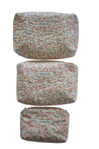 Three floral-patterned pouches with 'Kitt Designs' label beauty pouch travel pouch mini pouch