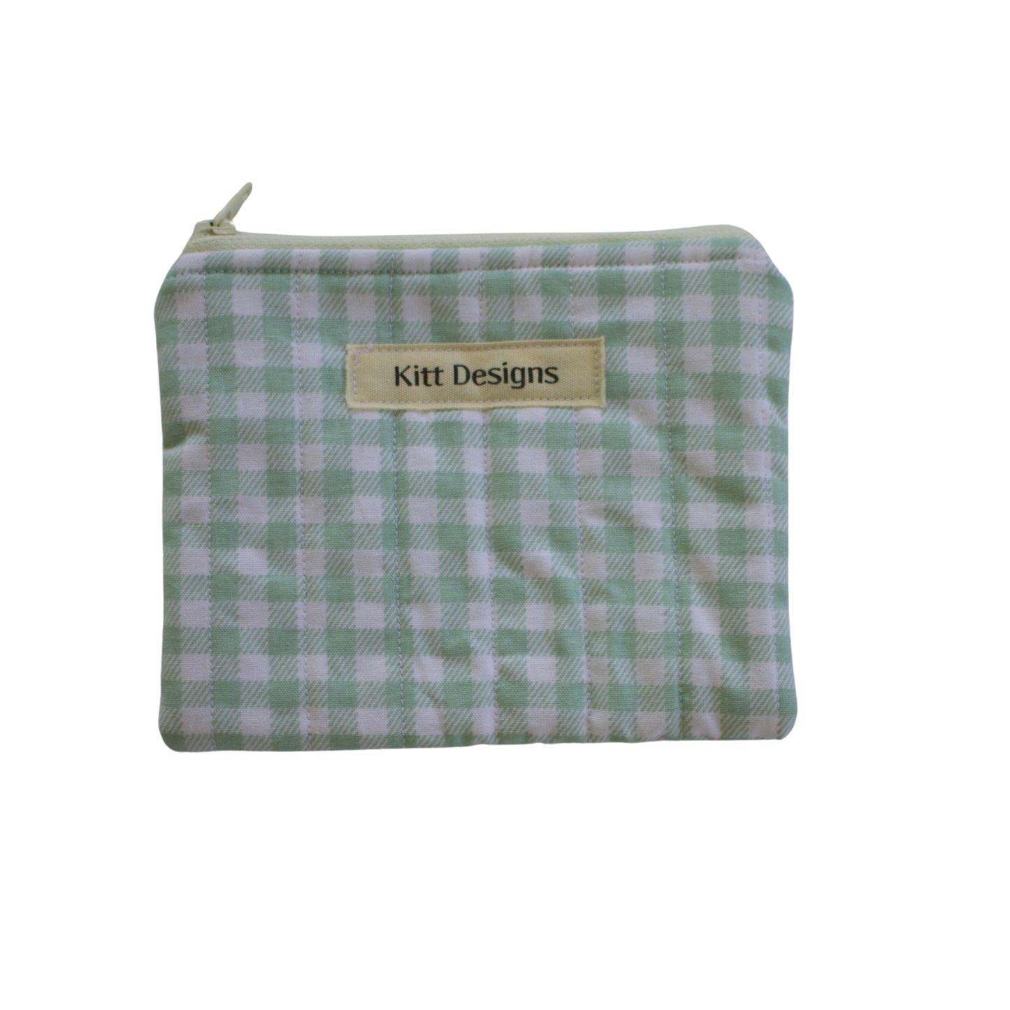 Green checkered pouch with a visible brand label green gingham coin pouch