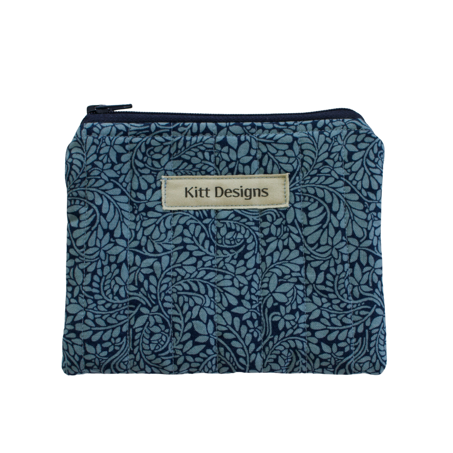 Blue floral patterned pouch with 'Kitt Designs' label coin pouch