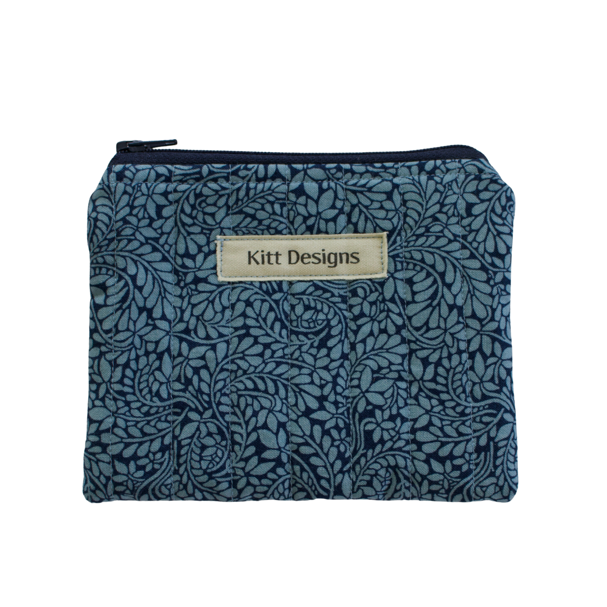 Blue floral patterned pouch with 'Kitt Designs' label coin pouch