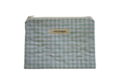 Green checkered pouch with 'Kitt Designs' label zipper pouch green gingham