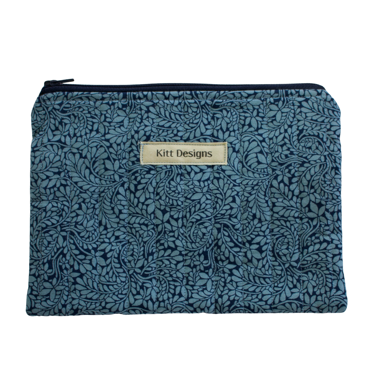 Floral patterned pouch with 'Kitt Designs' label zipper pouch