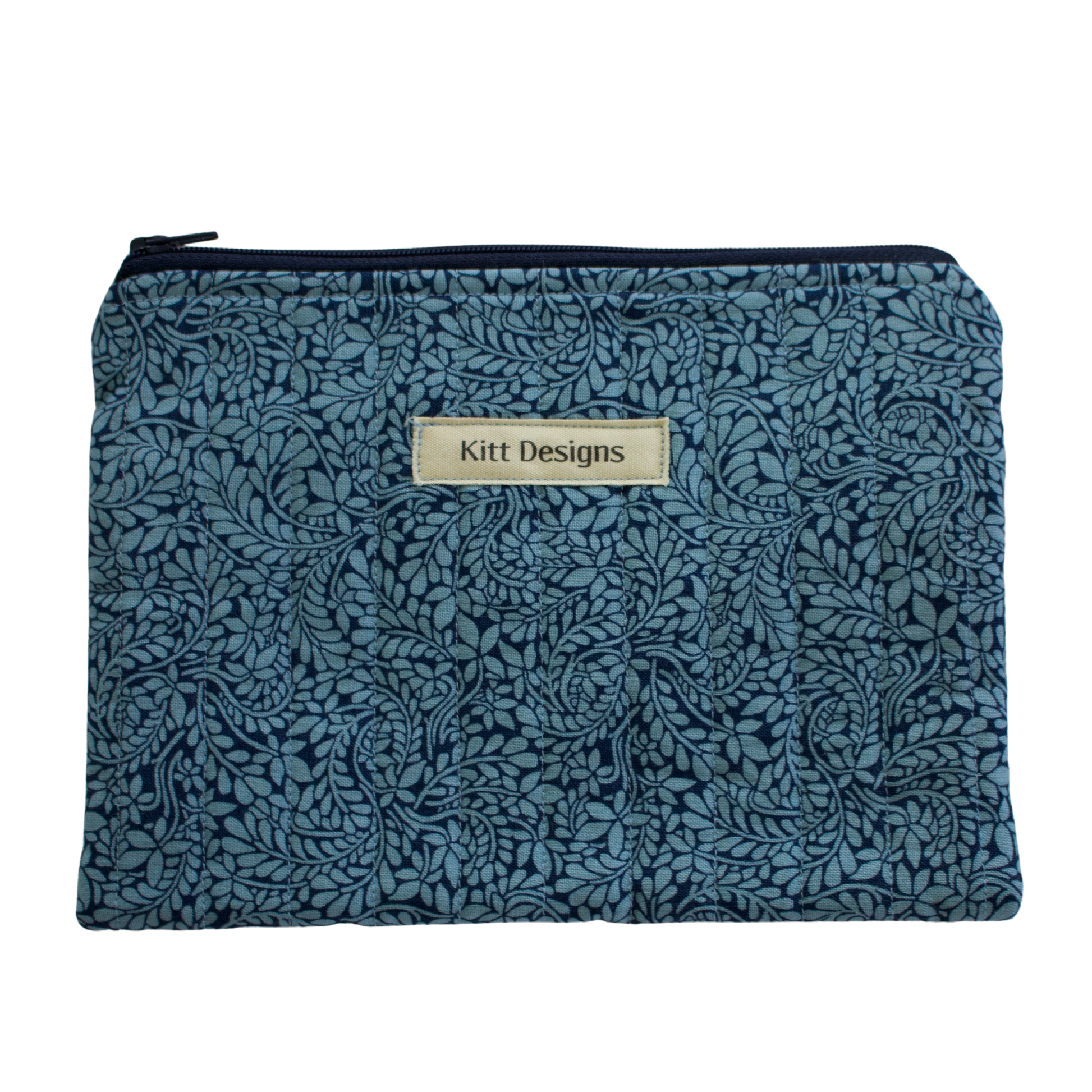Floral patterned pouch with 'Kitt Designs' label zipper pouch