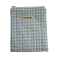 Green and white checkered pouch with 'Kitt Designs' label kindle pouch