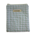 Green and white checkered pouch with 'Kitt Designs' label kindle pouch
