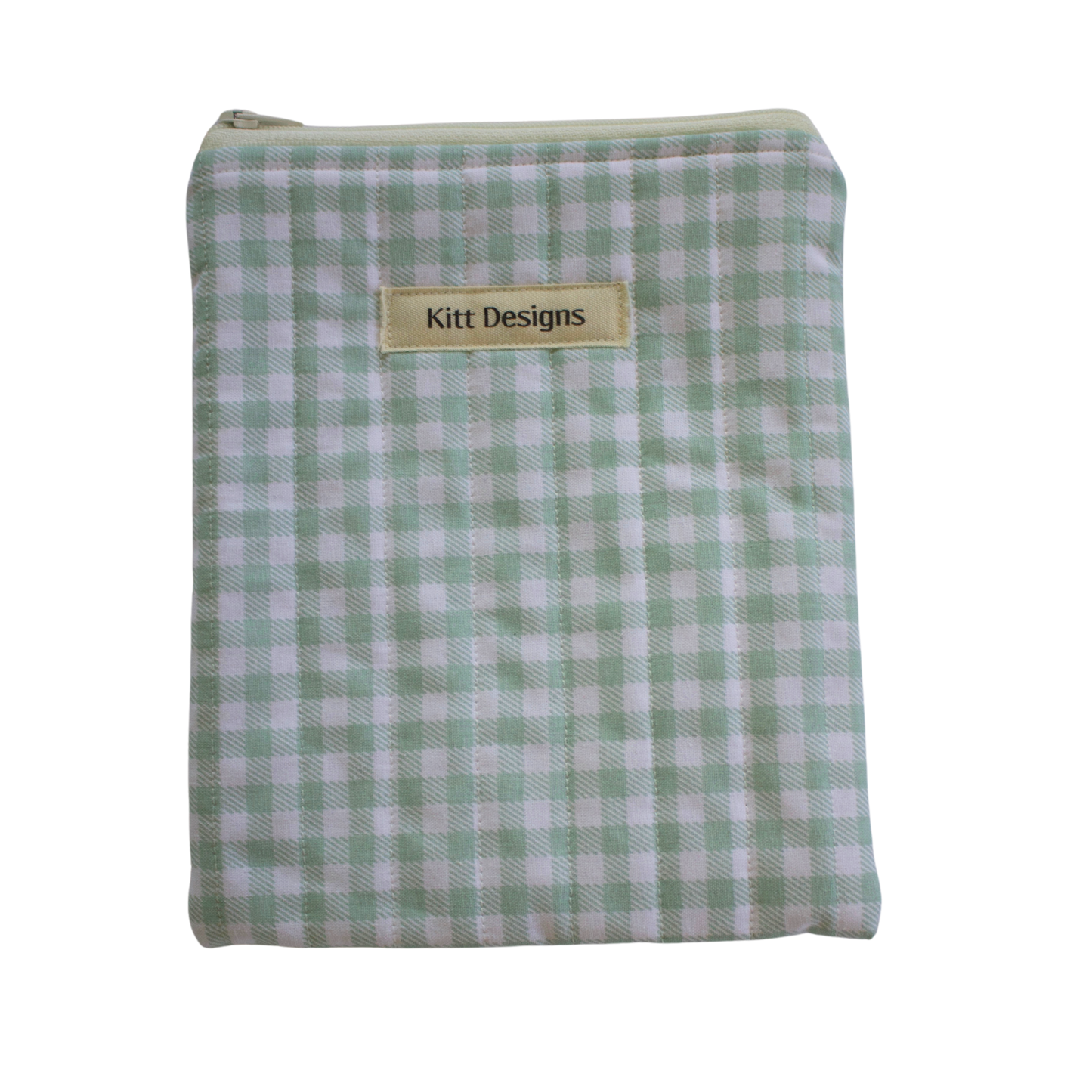 Green and white checkered pouch with 'Kitt Designs' label kindle pouch