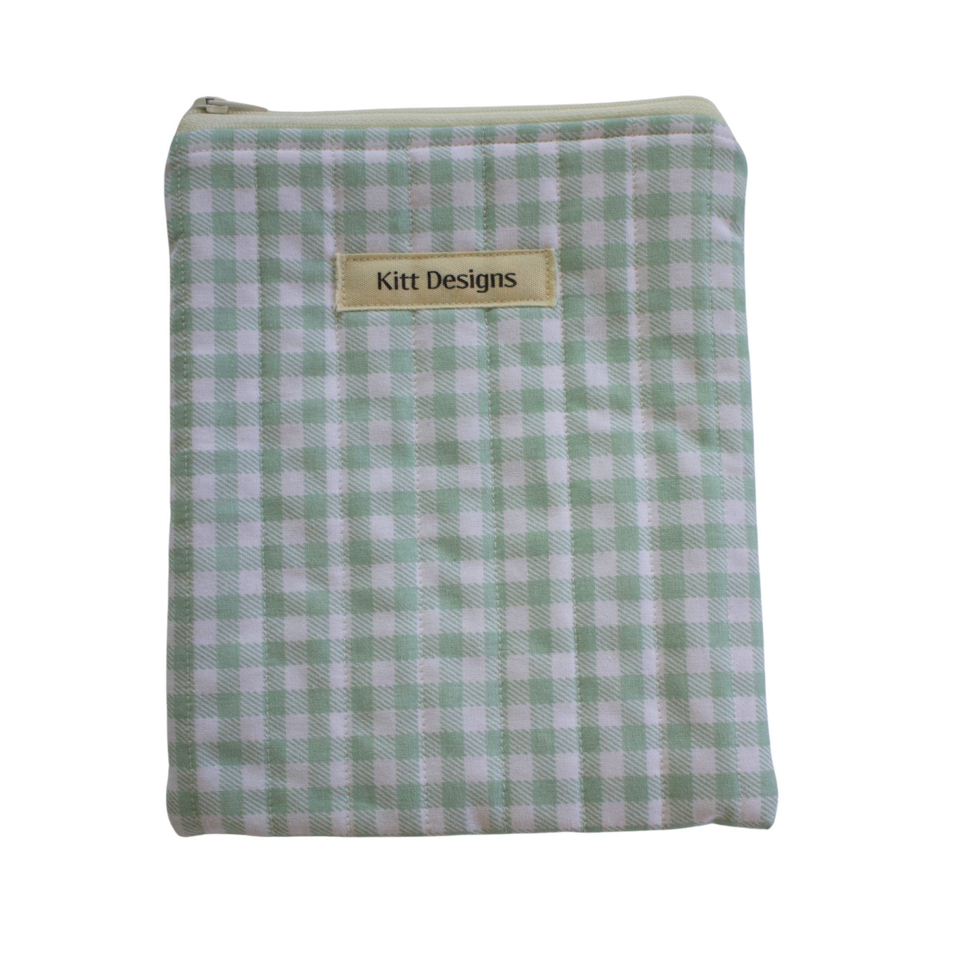 Green and white checkered pouch with 'Kitt Designs' label kindle pouch
