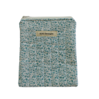 Fabric pouch with a pattern and 'Kitt Designs' label kindle pouch