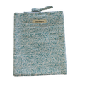 Floral patterned pouch with a visible brand label large book sleeve