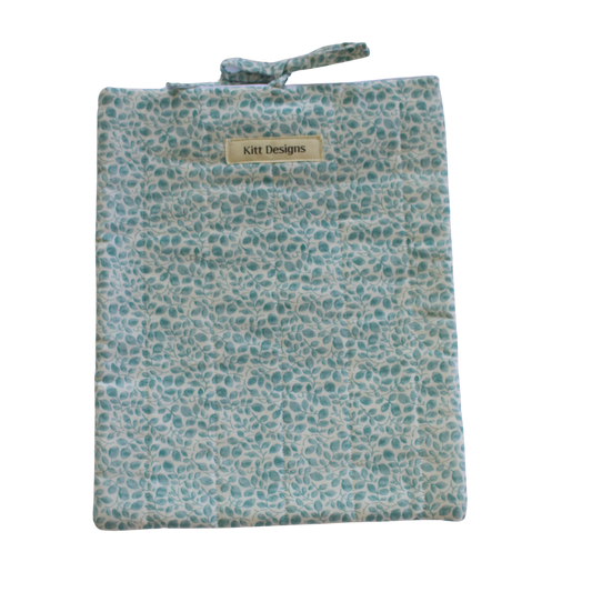Floral patterned pouch with a visible brand label large book sleeve