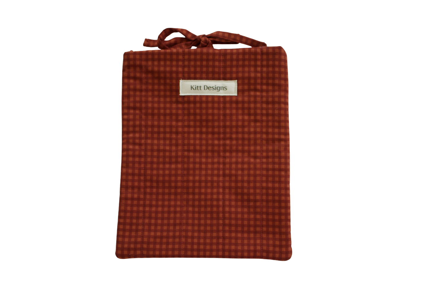 Red checkered pouch with a brand label small book sleeve