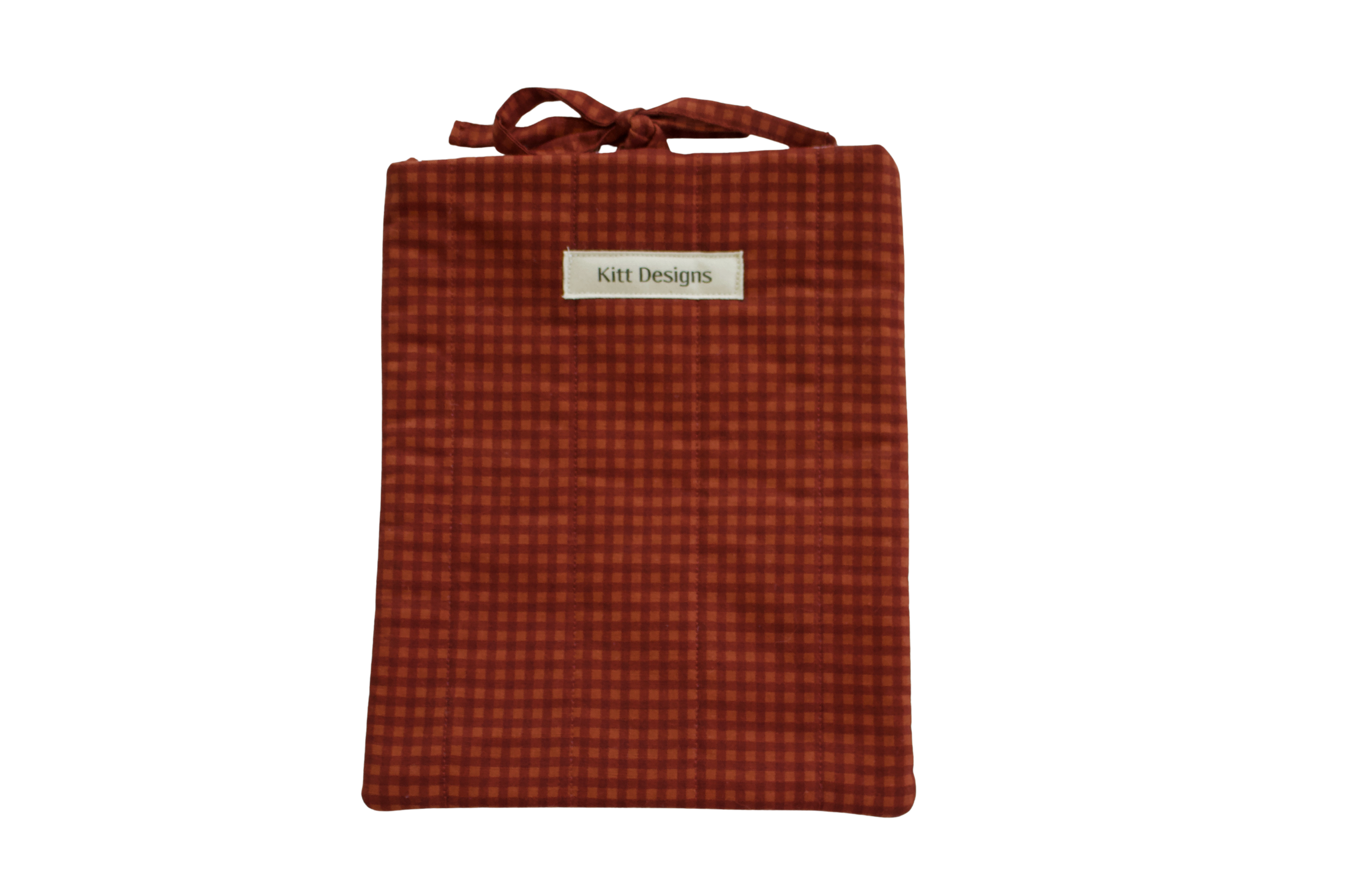 Red checkered pouch with a brand label small book sleeve