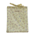 Floral-patterned fabric bag with 'Kitt Designs' small book sleeve