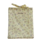 Floral-patterned fabric bag with 'Kitt Designs' small book sleeve