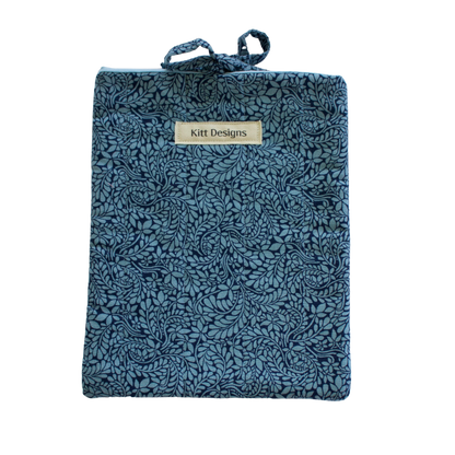 Blue textured pouch with a brand label small book sleeve