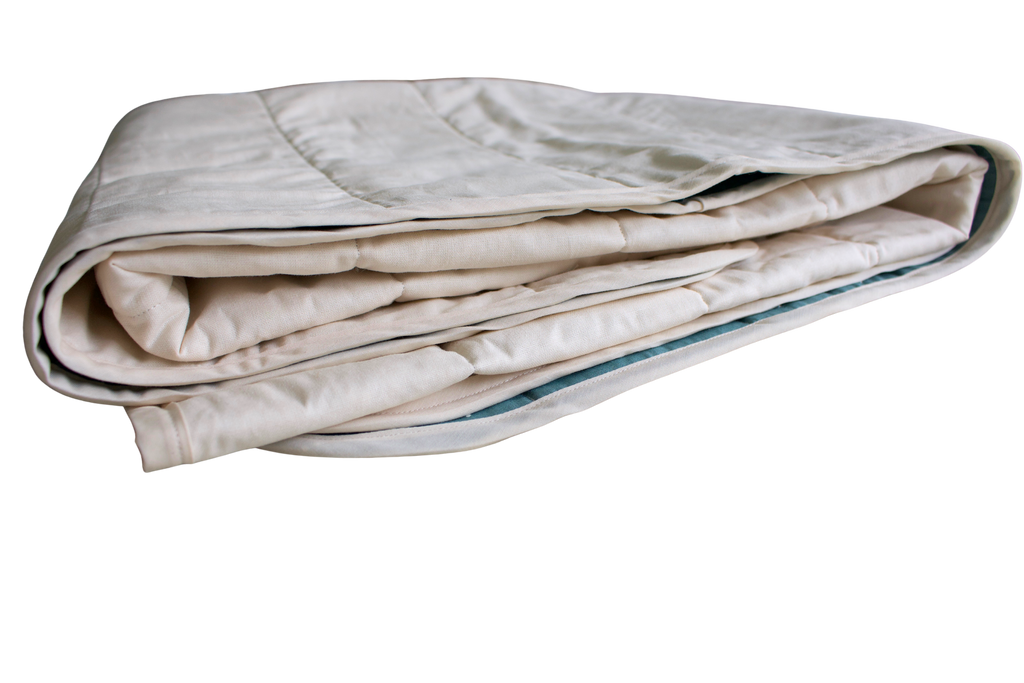 Teal whole cloth quilt for kids folded