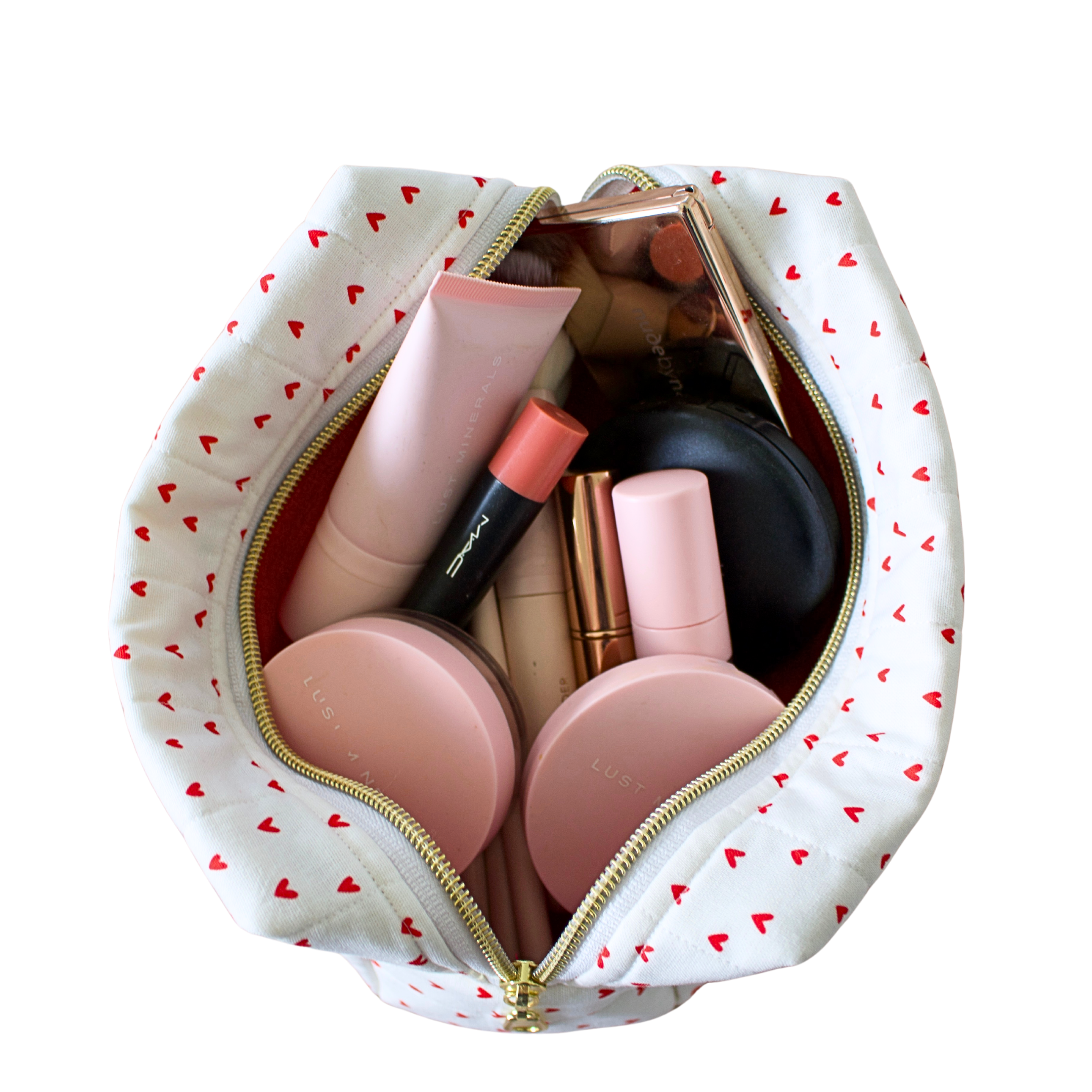 An open white cosmetic pouch with a red heart pattern and gold zipper, shown from a top-down view on a white background. Makeup bag. Handmade Makeup pouch. Handmade quilted pouch